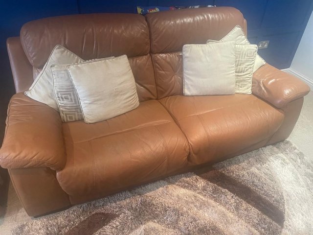Preview of the first image of 3 seater tan leather sofa.