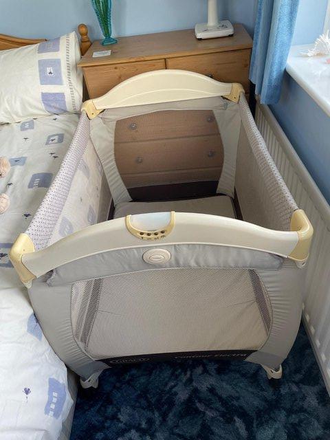 Preview of the first image of Graco Contour Electra Travel Cot with Bassinet and Carrybag.