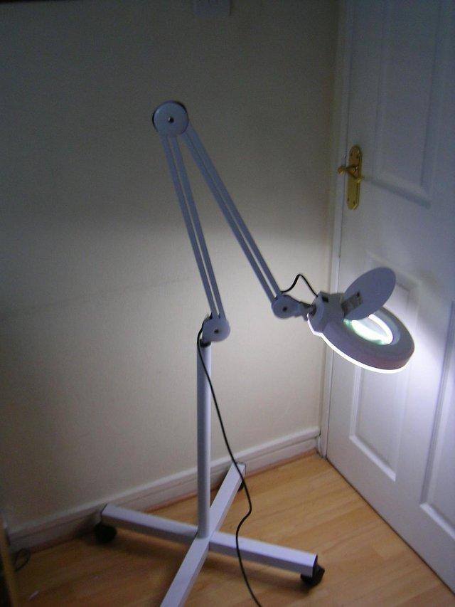 Preview of the first image of Magnifier Floor Lamp with wheels.
