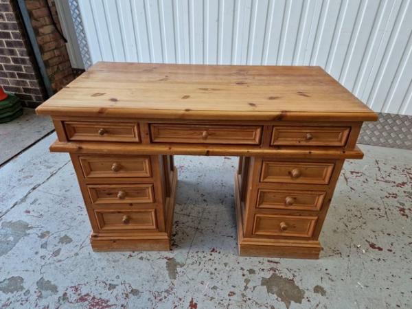 Image 3 of A Substantial Wooden Desk with Drawers.