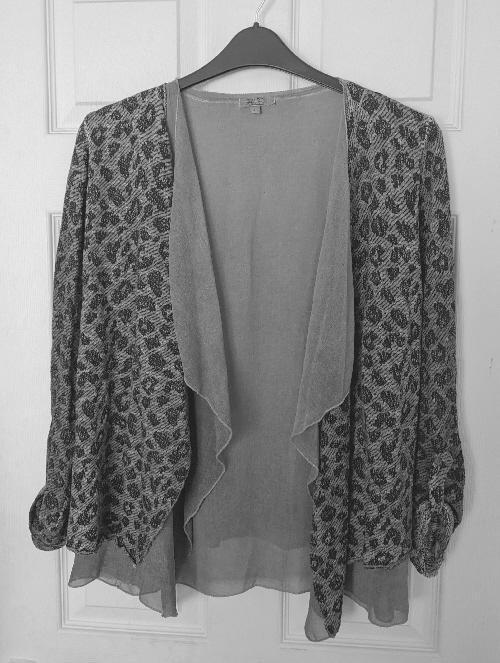 Preview of the first image of Ladies Layered Waterfall Cardigan By Stella Rosa - Size L.