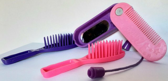 Preview of the first image of BARBIE ACCESSORY SET OF 4 COMB/MIRROR BRUSHES.