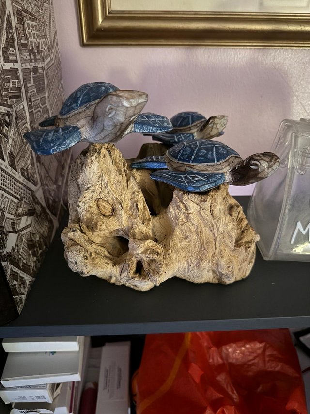 Preview of the first image of Turtles sculpture hand made wood carved.
