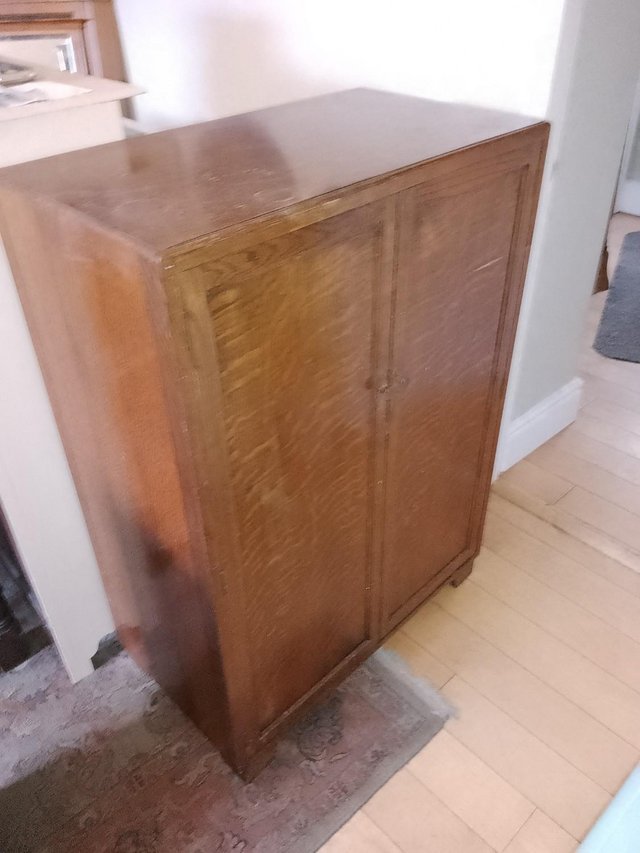 Preview of the first image of Wooden shoe (?) cupboard.