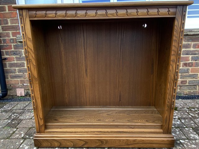 Preview of the first image of Ercol Mural Dark Display Cabinet.