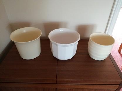 Preview of the first image of 3 assorted sized and design planters.