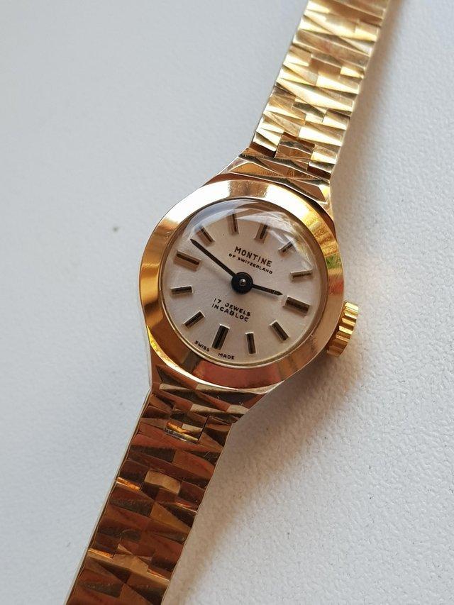 Preview of the first image of Ladies vintage hand wind montine 17 jewel watch slim wrist.