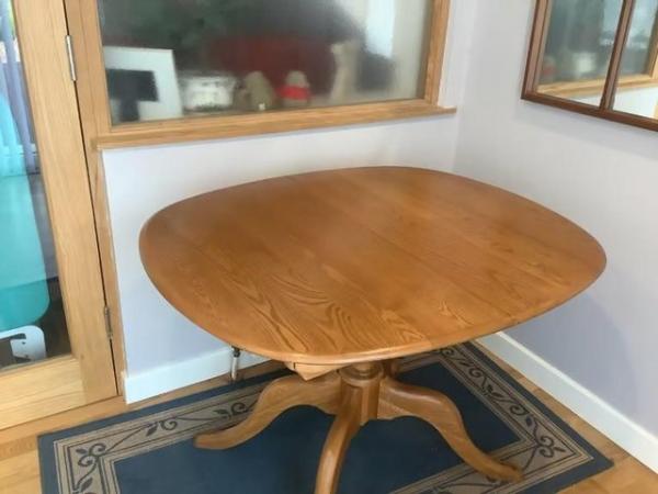 Image 1 of ERCOL CHESTER EXTENDING FING TABLE,NEVER EVER USED.