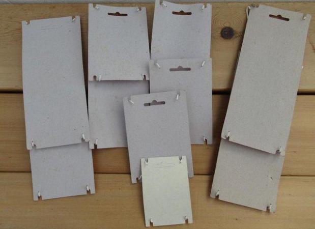 Image 2 of White Flexible Wire Wall Plate Hangers x 10