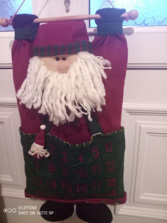 Preview of the first image of Santa hanging Advent Calendar with date marker, used VGC.