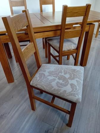Image 3 of Solid oak extendable dining table and 4 chairs