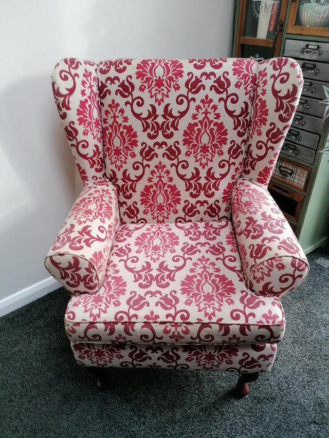 Preview of the first image of Red brocade wing armchair for sale.