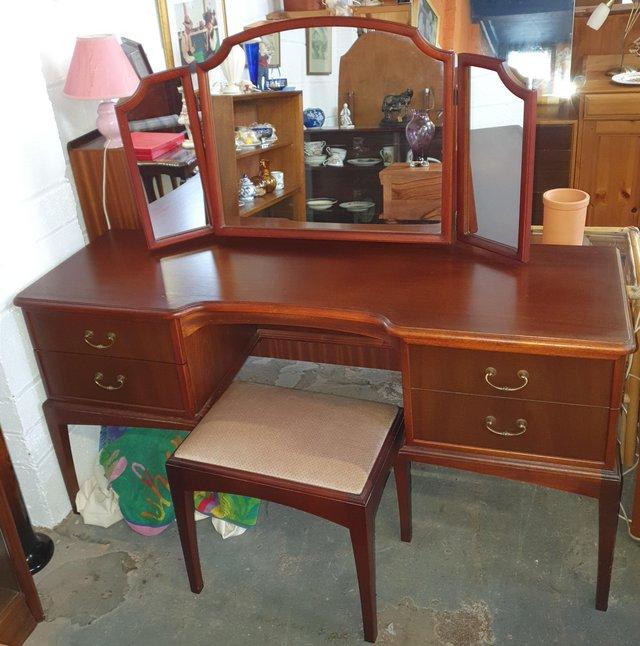 Preview of the first image of Dressing table with cushioned stool.