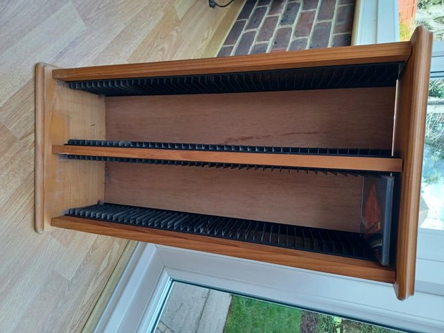 Preview of the first image of Wooden CD rack that holds over 50 CDs.