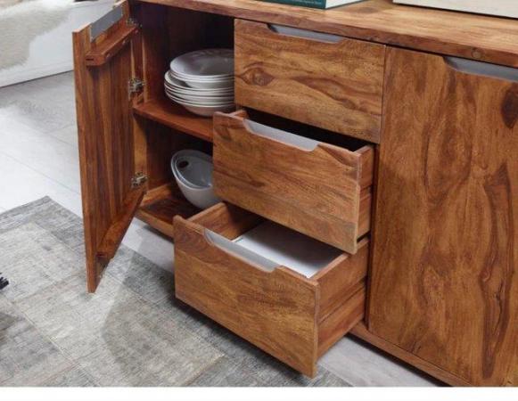 Image 3 of Sheesham side cupboard..has three drawers