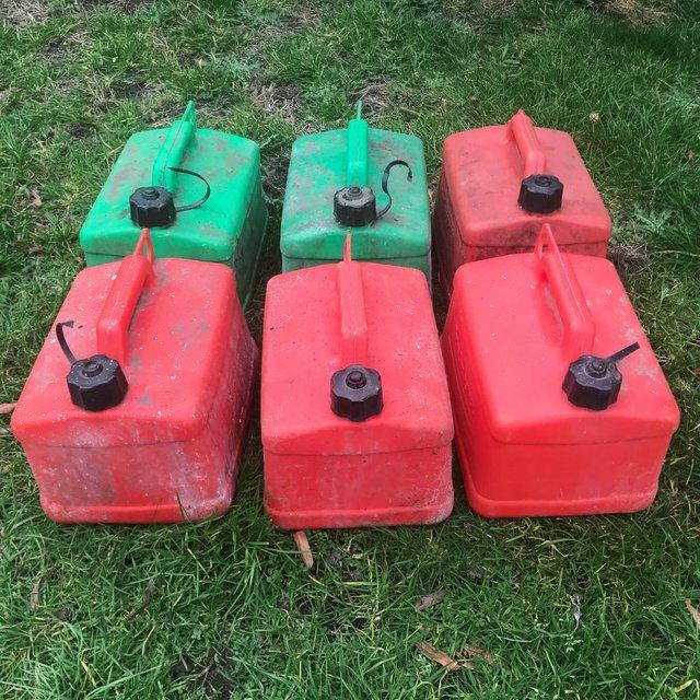Preview of the first image of 6 empty plastic 5 litre fuel cans, screw caps, no nozzles..