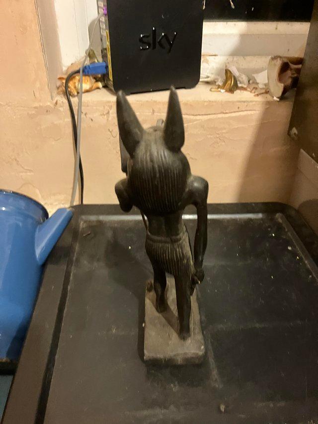 Preview of the first image of Ceramic figurine of the Egyptian jackal god figurine.