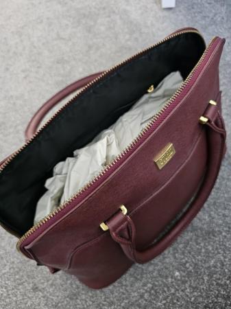 Image 1 of Storm Bag in burgundy as new
