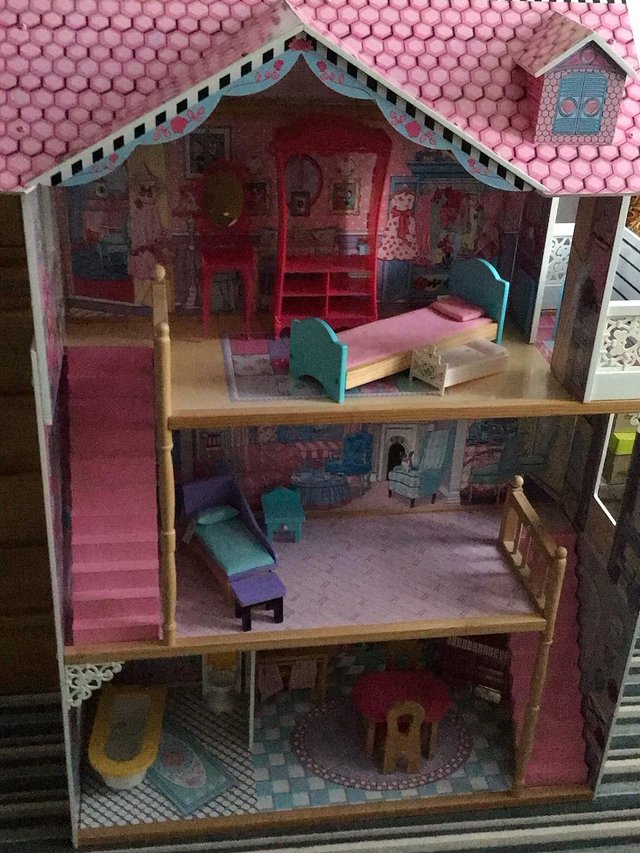 Preview of the first image of ELC WOODEN DOLL HOUSE with some furniture.
