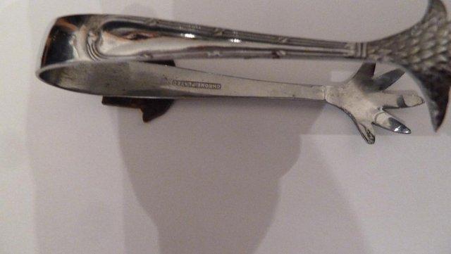 Image 2 of sugar tongs Chrome plated .Crows feet design