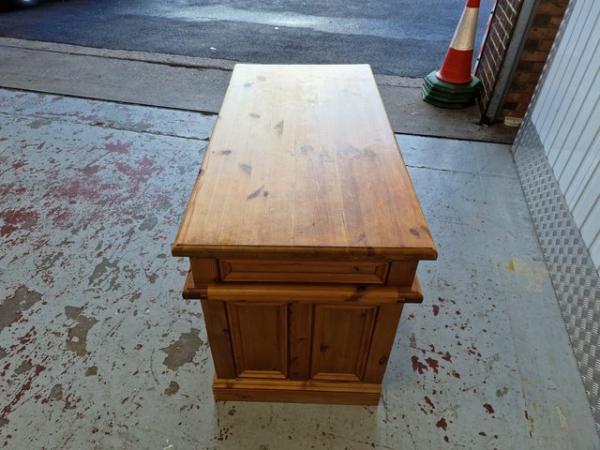 Image 1 of A Substantial Wooden Desk with Drawers.