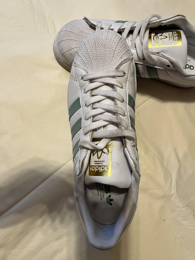 Preview of the first image of Women addidas  shoes worn few times uk size 8.