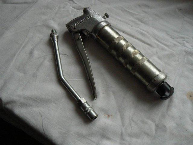 Preview of the first image of Warner High Pressure Lever Action Grease gun Used.