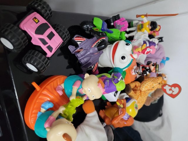 Preview of the first image of Pre-loved variety of small toys inc McD's, cars, bike,  Ty,.