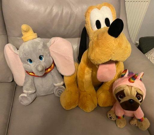 Image 1 of Disney Pluto and dumbo cuddly toys