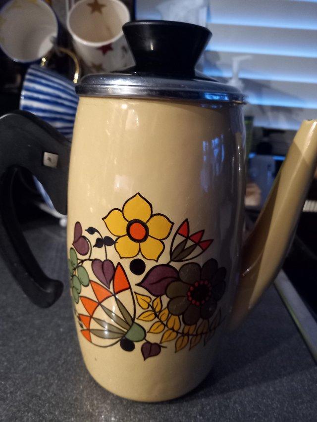 Preview of the first image of VINTAGE ENAMEL COFFEE POT USED.