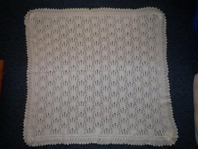 Preview of the first image of Lacy Hand Knitted White SHAWL.