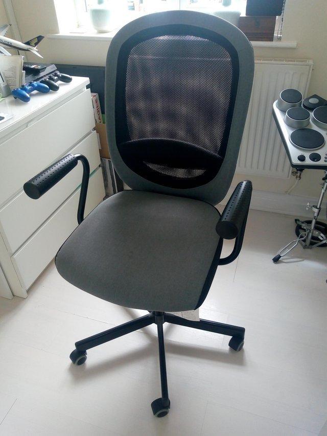 Preview of the first image of IKEA black office chair with arms.