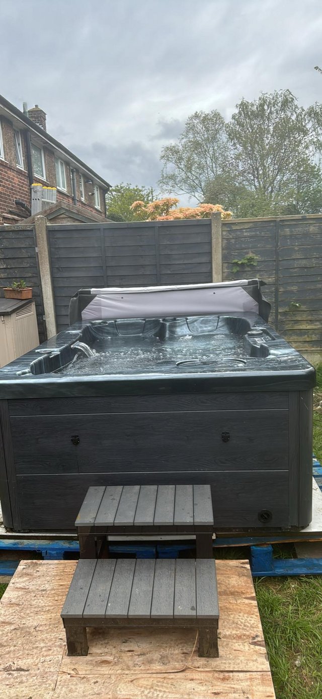 Preview of the first image of Hot tub for sale two seats and one lounger.