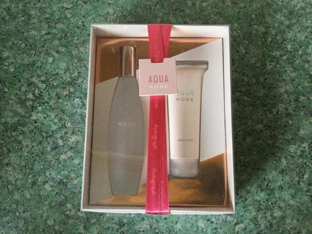 Preview of the first image of MARKS AND SPENCER AQUA ROSE SET.