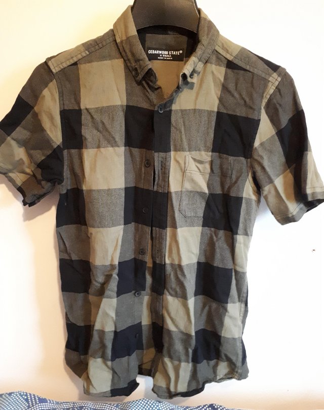 Preview of the first image of Cedarwood green/black checked shirt size xsmall.