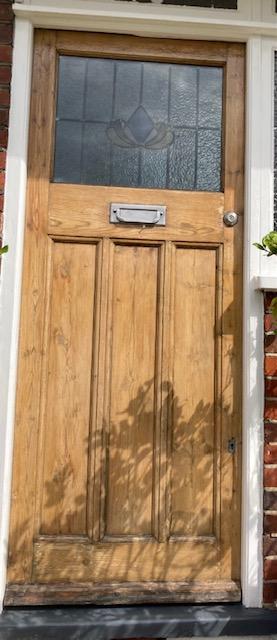 Preview of the first image of 1929 original solid wood front door and glass.