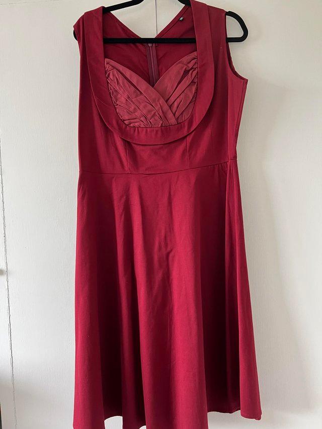 Preview of the first image of 50’s style claret red dress size approx 18/20.