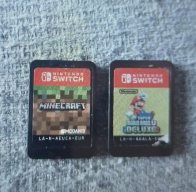 Preview of the first image of 2 Nintendo switch games for sale.