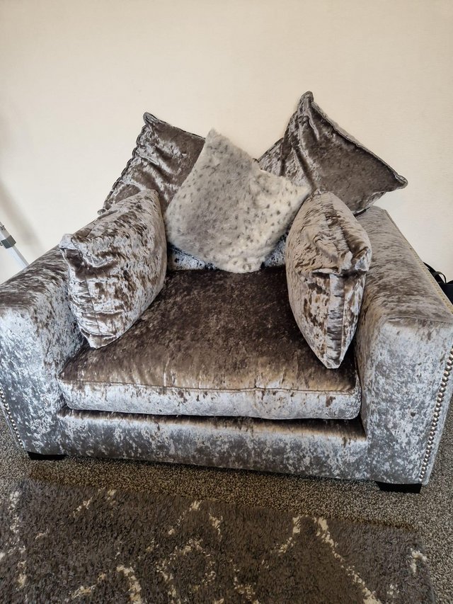 Preview of the first image of DFS Xara Crushed Velvet Cuddle Chair.