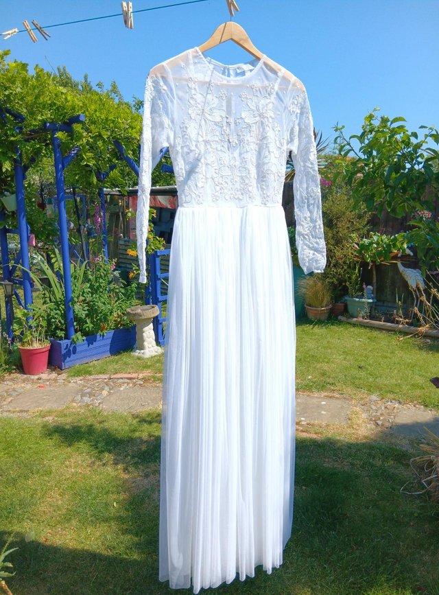 Preview of the first image of Wedding Dress - White - As New Condition.