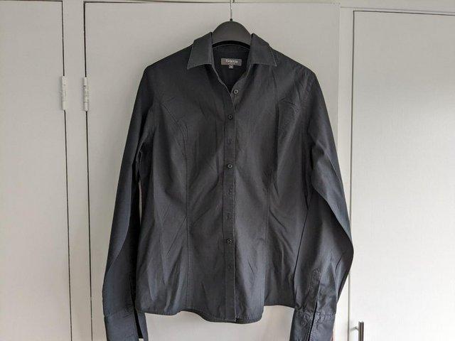 Preview of the first image of TM Lewin womens black fitted cotton shirt.