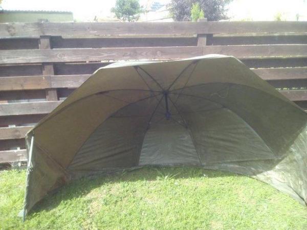 Image 2 of used storm brolly with poles£20.00 or make an offer