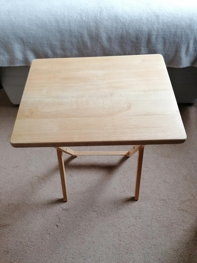 Preview of the first image of Small Wooden fold down table.