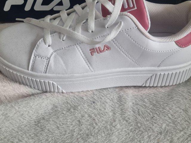 Preview of the first image of Womens pink & white fila trainers.