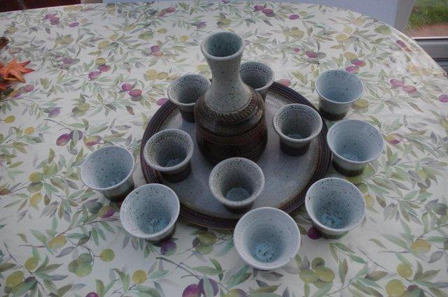 Preview of the first image of Purbeck pottery wine set with cups and decanter.