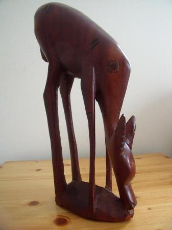 Image 1 of Large 12" tall vintage hand carved wooden deer/antelope.