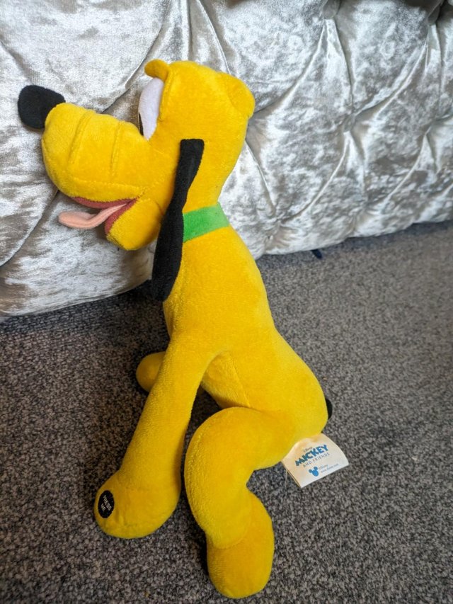 Preview of the first image of PLUTO Disney Dog Plush Toy with Sound.