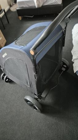 Image 5 of Dog stroller.blue with black net.