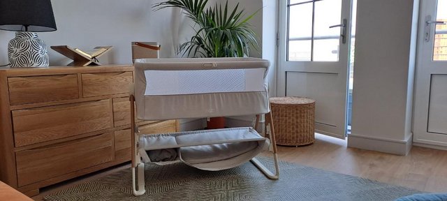 Preview of the first image of Excellent condition bedside crib and bouncer.
