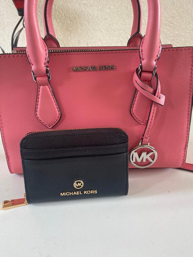 Preview of the first image of Almost new mk bag and coin purse.